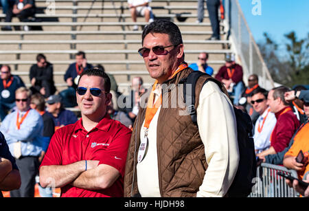 Mobile, Alabama, USA.  24th January, 2017.  NFL Carolina Panthers Head Coach Ron Rivera (right) scouts upcoming players during a Reese’s Senior Bowl practice at Ladd-Peebles Stadium.  Credit:  Brad McPherson / Alamy Live News Stock Photo