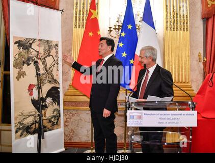 Paris, France. 24th Jan, 2017. Chinese ambassador to France Zhai Jun (L) and French National Assembly Speaker Claude Bartolone attend a reception hosted by Bartolone to mark the Chinese Lunar New Year in Paris, France, Jan. 24, 2017. Credit: Chen Yichen/Xinhua/Alamy Live News Stock Photo