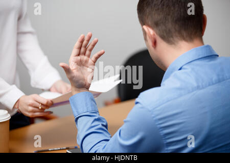 Employees of office with documents Stock Photo