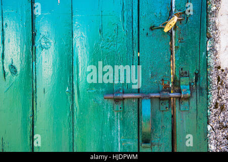 Padlock on a wooden door Stock Photo