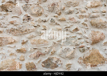 Old stone and brick medieval wall texture and background Stock Photo
