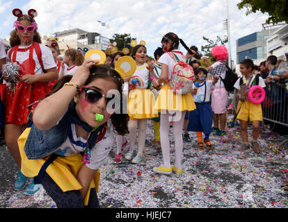 Limassol, Cyprus - March 13, 2016: Happy people in teams dressed with colorfull costumes at famous Limassol Carnival Parade on March 13 2016 , Cyprus. Stock Photo