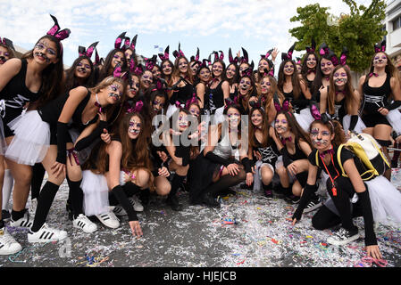 Happy people in teams dressed with colorful costumes at famous Limassol Carnival Parade on March 13 2016 , Cyprus. Stock Photo