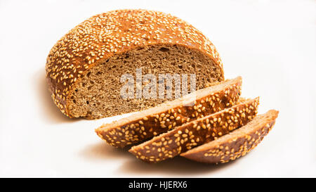 Tasty sliced rye bread isolated on white background Stock Photo