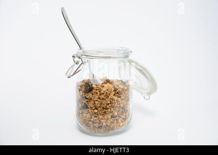 Home made granola in a glass jar Stock Photo