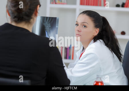woman patient consultation in hospital or surgery office Stock Photo