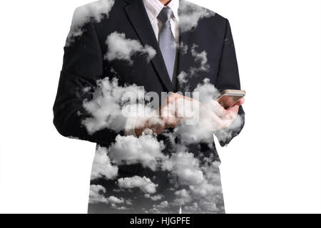 Double exposure of business man hand hold and touch screen smart phone, mobile, clouds and sky as Cloud Computing Network concept. Stock Photo