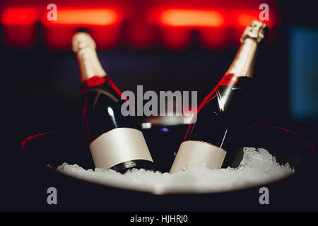 Two bottles of champagne in a bucket Stock Photo