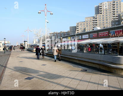 Tourists walking on Scheveningen Boulevard. North Sea coastal resort Scheveningen - Den Haag (The Hague), Netherlands Stock Photo