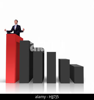 Image of a businessman standing on the top of financial charts Stock Photo
