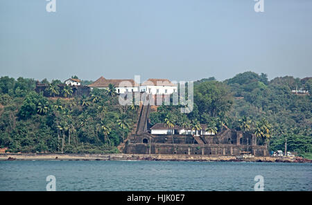 Renovated Portuguese era Reis Magos Fort in Goa, India, view from Mondovi River Stock Photo