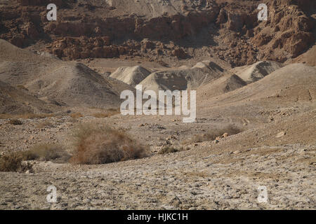 Hills of Lissan Marl a sedimentary rock by the Dead Sea, here near Qumran were the residential caves of this Essenes settlement. Stock Photo