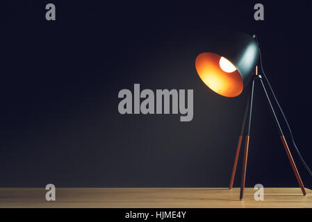 Desk lamp on empty wooden office table as space for text or product placement Stock Photo