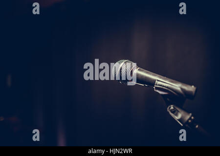 Close up shot of a microphone on a stand. Stock Photo
