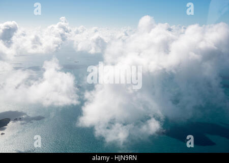 Aerial view of clouds above the Whitsunday Islands, taken from a light aircraft scenic flight, Queensland Australia Stock Photo