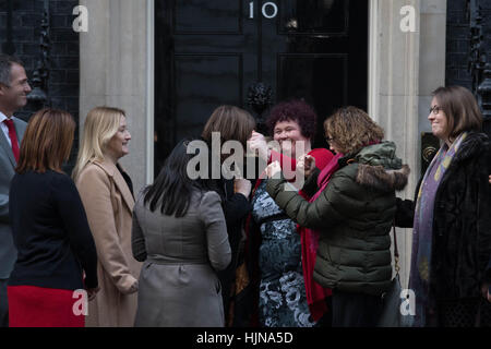 Claire Throssell, whose children were killed by her abusive ex-husband in 2014, hands in petition to Downing Street in London calling for an end to unsafe child contact with dangerous perpetrators of domestic violence. Stock Photo