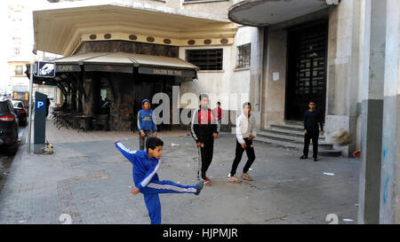 Kids playing football on the street. Casablanca, Morocco. Stock Photo