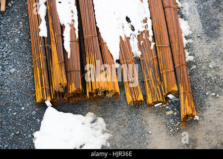 Rusty wire as a texture of old metal coil iron bars Stock Photo