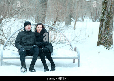 Adult couple resting in park Stock Photo
