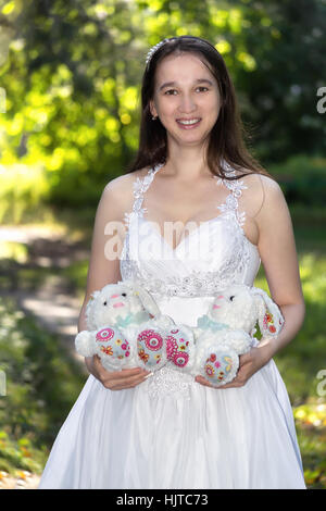 Bride in white dress in the Park Stock Photo
