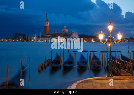 Early morning view over Gondolas and San Giorgio Maggiore, Venice, Veneto, Italy Stock Photo