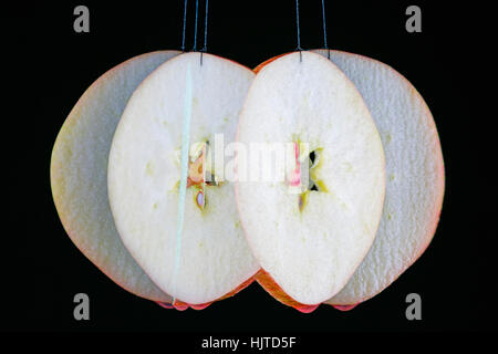 Slice of apple.  Multiple exposure.  Action image. Stock Photo