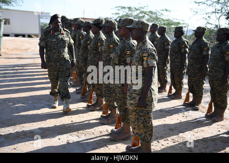 The Chief of Defence Forces of the Uganda Peoples Defence Forces, Gen. Katumba Wamala inspects a guard of honour mounted by Ugandan soldiers serving under the African Union Mission in Somalia (AMISOM) on January 03, 2017. Gen. Katumba is on a working visit to Somalia.   Raymond Baguma Stock Photo