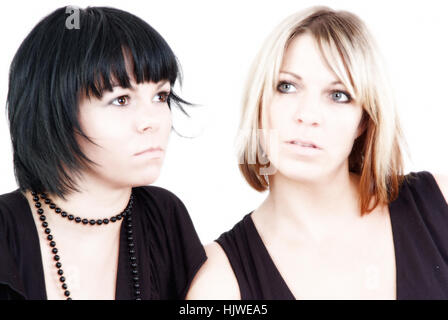 Dark-haired and blond women Stock Photo