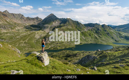 Hiker enjoying the view, mountains, Low Giglachsee, Rohrmoos-Obertal, Schladminger Tauern, Schladming, Styria, Austria Stock Photo