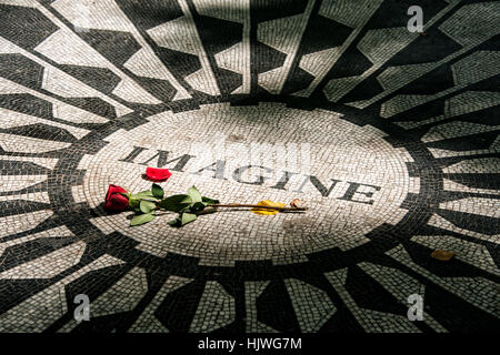 Strawberry Fields Memorial, Imagine mosaic with red rose in memory of John Lennon, Central Park, Manhattan, New York City, USA Stock Photo
