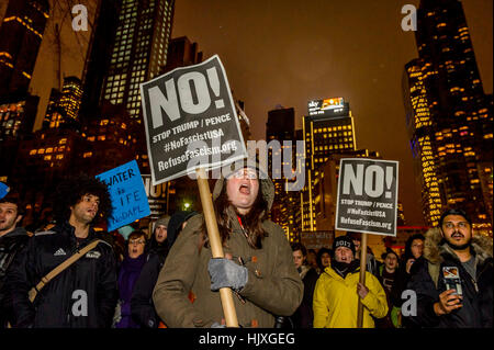 New York, USA. 24th Jan, 2017. Hundreds of New Yorkers joined Actress Jane Fonda and Film Director Josh Fox in the evening of January 24 at Columbus Circle in New York for a rally and march to Trump Tower in a massive peaceful protest after Trump signs orders to advance Keystone XL and Dakota Access Pipelines. Credit: Erik McGregor/Pacific Press/Alamy Live News Stock Photo