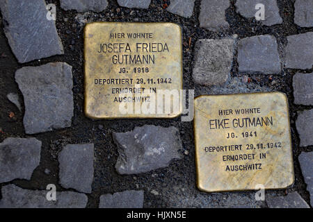 Stolperstein (stumbling stone) on the streets of Berlin commemorating Josefa Freida Gutmann and Eike Gutmann Stock Photo