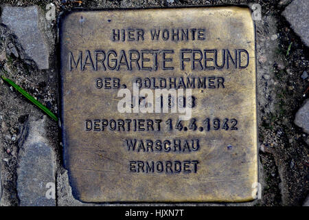 Stolperstein (stumbling stone) on the streets of Berlin (commemorating Margarete Freund) Stock Photo