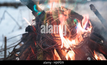 Firing wire in fire Stock Photo