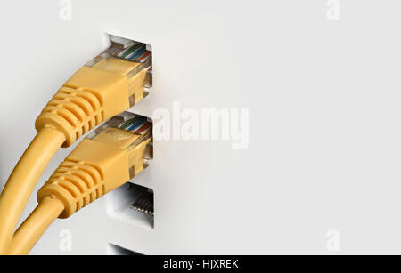 close up of network cables connected to switch Stock Photo