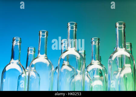 Crystal bottlenecks of empty glass bottles Stock Photo