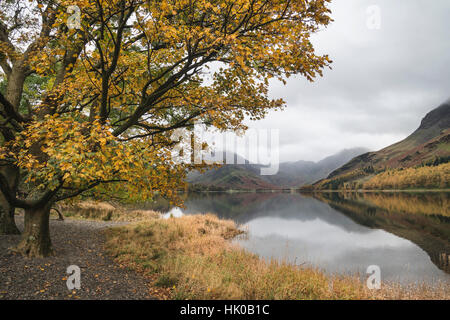 Stunning Autumn Fall landscape image of Lake Buttermere in Lake District England Stock Photo