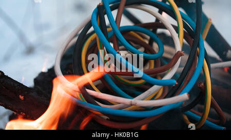 Firing wire in fire Stock Photo