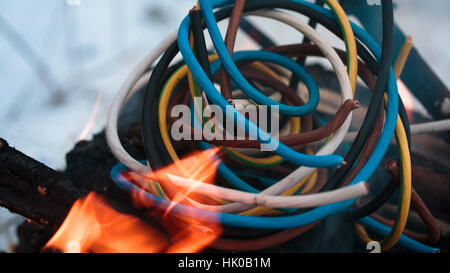 Firing wire in fire Stock Photo