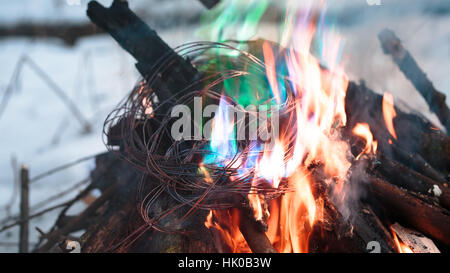 Firing wire in fire Stock Photo