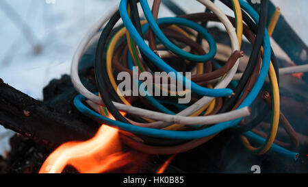 Firing wire in fire Stock Photo