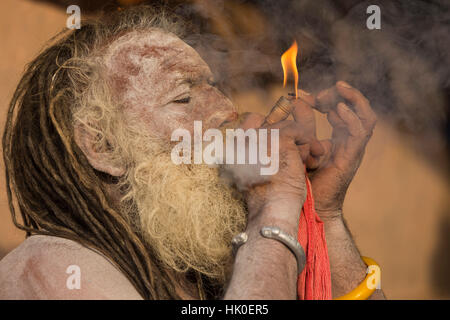 Sadhu smoking. Varanasi, India Stock Photo