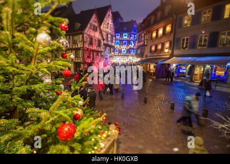 Colourful lights on Christmas trees and ornaments at dusk, Colmar, Haut-Rhin department, Alsace, France Stock Photo