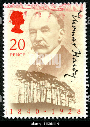 GREAT BRITAIN - CIRCA 1990: A used postage stamp from the UK, commemorating British novelist and poet Thomas Hardy, circa 1990. Stock Photo