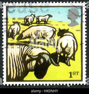 GREAT BRITAIN - CIRCA 2005: A used postage stamp from the UK, depicting an illustration of a flock of Sheep, circa 2005. Stock Photo