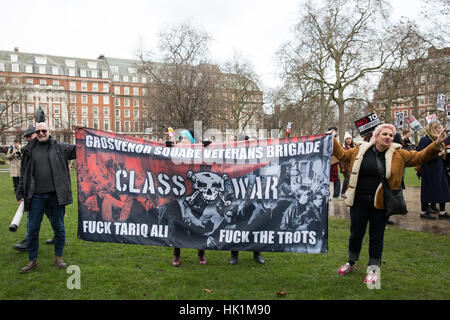 London, UK. 4th February, 2017. Class War outside the US embassy in Grosvenor Square before a march through Central London to protest against the travel restrictions to the United States imposed by Executive Order on seven Muslim-majority countries by President Donald Trump and the lack of strong criticism of those measures by the British Government. The order made by President Trump bans travel to the United States from Iran, Iraq, Syria, Sudan, Somalia, Libya and Yemen. Credit: Mark Kerrison/Alamy Live News Stock Photo