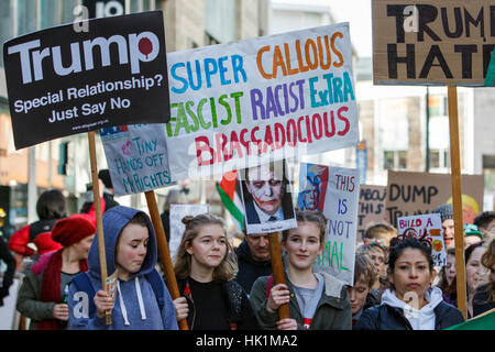 Bristol, UK, 4th February, 2017. Protesters carrying anti trump placards and signs are pictured taking part in a protest march and rally against President Trump's Muslim Ban. The protesters also called for Trumps state visit to the UK to be cancelled. Credit: lynchpics/Alamy Live News Stock Photo