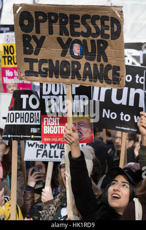 London, UK. 4th Feb, 2017. Anti President Trump march and rally organised to oppose the the recent Presidential order temporarily banning travellers from 7 majority Muslim countries from entering the United States. Marchers also rallied against what they say is the lack of criticism from the Theresa May's British Government of of the new Trump administration. Credit: Alex MacNaughton/Alamy Live News Stock Photo