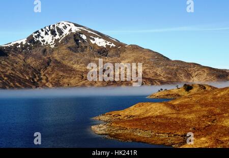Loch Quoich on a clear spring day looking towards Gairich in the West Highlands of Scotland Stock Photo
