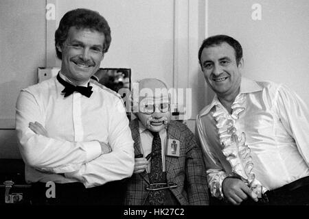 Ventriloquist Tony Addams (L) and Grandad (C) with comedian Harry Scott (R) back stage in Brighton, 1984. Stock Photo